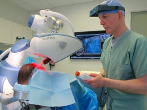 Dr. Bernstein Using the ARTAS Robot to Perform Robotic FUE