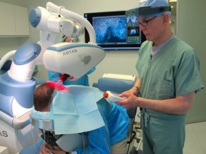 Dr. Bernstein performing Robotic Hair Transplant using ARTAS System
